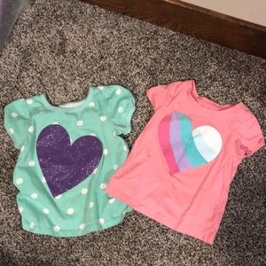 Two sparkling heart t’s